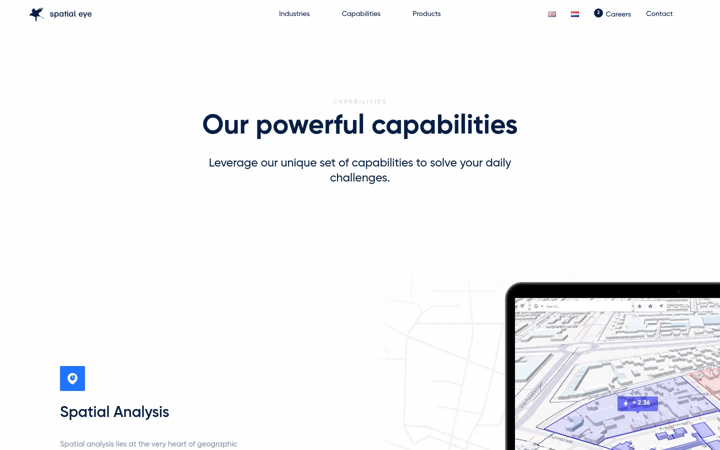 The desktop version features a clean, minimalist design with a white background and dark blue text. A large headline reads 'Our powerful capabilities' followed by a subheadline, centered above a section titled 'Spatial Analysis' which includes a blue icon and a partial view of a digital map on a laptop screen.
