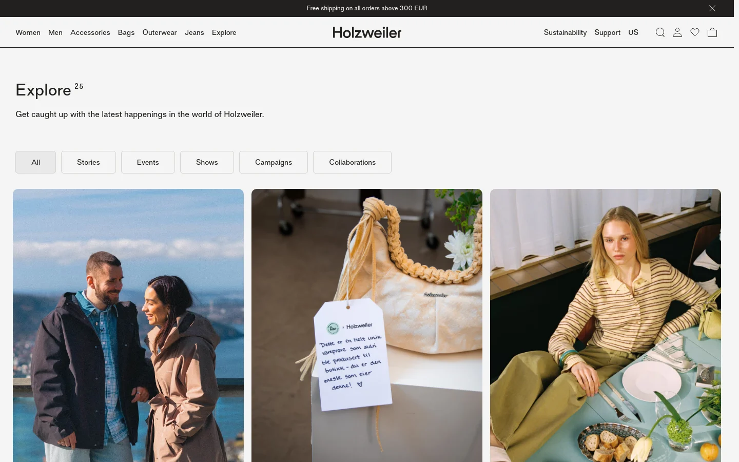 The desktop Explore page features a minimalist white design with a large hero image of a couple outdoors. Below the headline 'Explore 25', a horizontal row of pill-shaped filter buttons includes All, Stories, Events, Shows, Campaigns, and Collaborations. The layout uses large, high-quality editorial imagery arranged in a grid below the navigation.