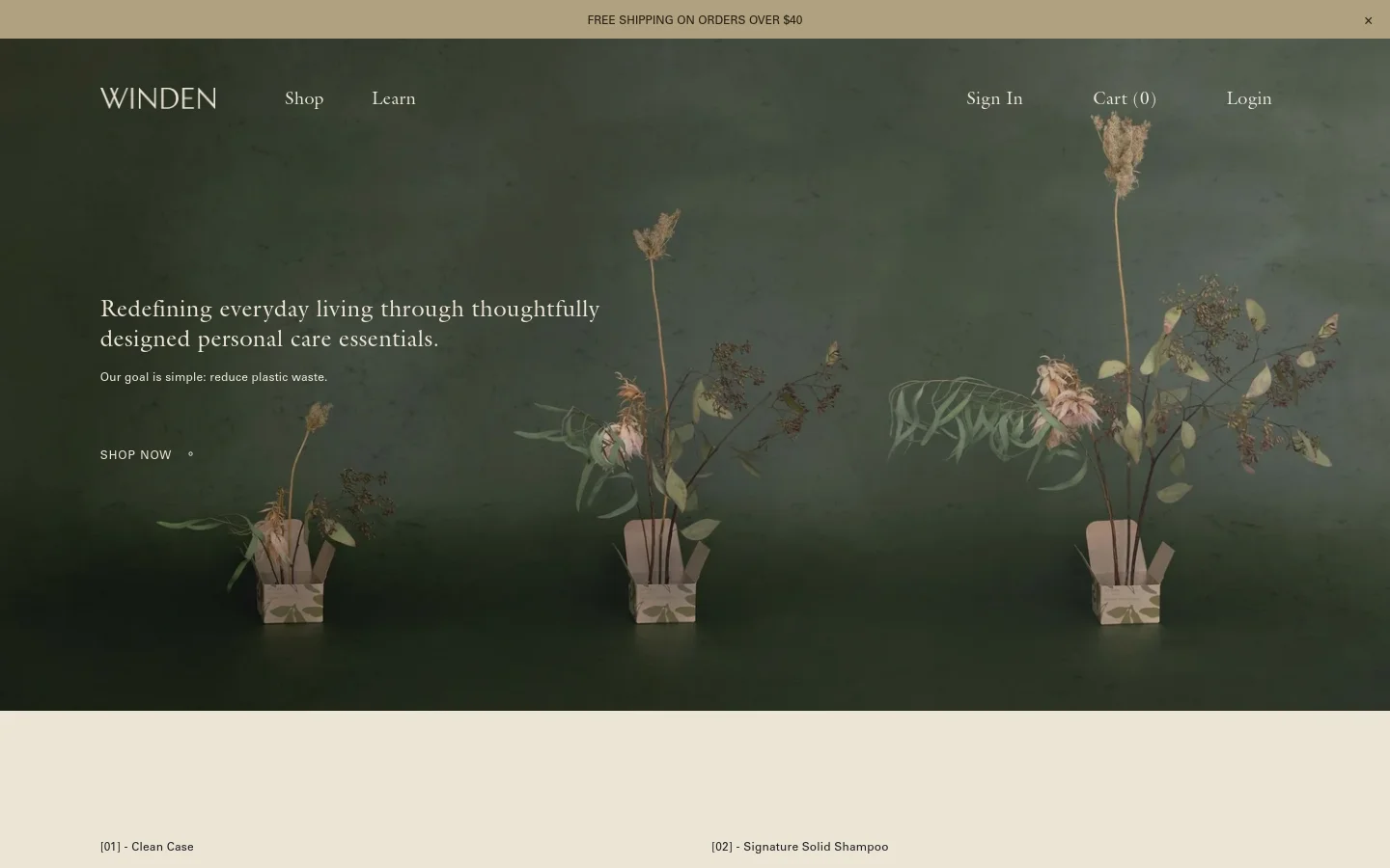 The desktop homepage features a dark green hero section with a large headline about redefining everyday living and a 'Shop Now' call to action. A minimalist botanical arrangement in a small vase sits against a textured green background. The navigation menu includes 'Shop', 'Learn', 'Sign In', 'Cart', and 'Login' against a cream-colored header.