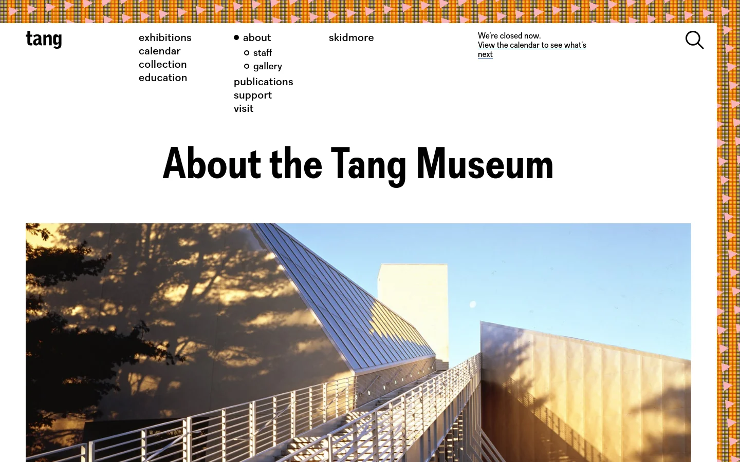 The desktop page features a clean white background with a top navigation menu containing links like exhibitions, calendar, and about. A large, bold headline reads 'About the Tang Museum' above a wide hero image showing the angular, modern architecture of the museum building under a clear sky. Below the image, a list of links includes media coverage, the National Advisory Council, and staff contacts.