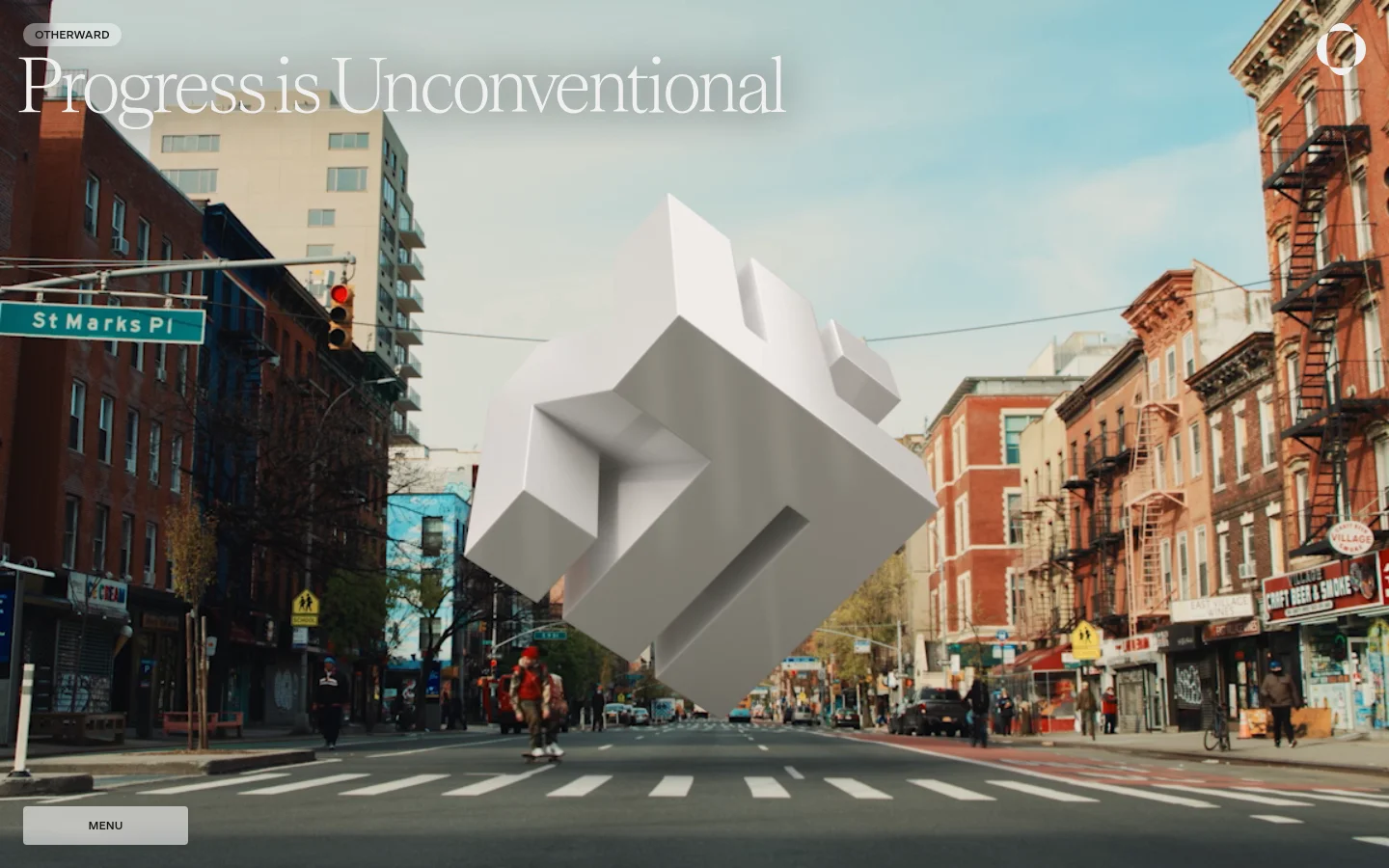 The desktop homepage features a large hero image of a New York City street scene with a giant, white 3D geometric shape floating in the center. The headline 'Progress is Unconventional' is displayed in large white serif text, with the 'Otherward' logo in the top left and a circular icon in the top right. A minimalist 'MENU' button is located in the bottom left corner.