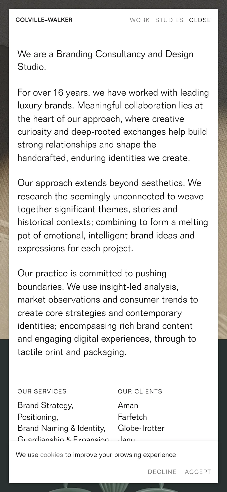 The mobile version transitions to a single-column vertical layout optimized for scrolling. The text is centered or left-aligned with increased line spacing for readability on small screens, and the multi-column information from the desktop view is stacked sequentially. The large background image remains visible but is cropped to focus on the central textures.