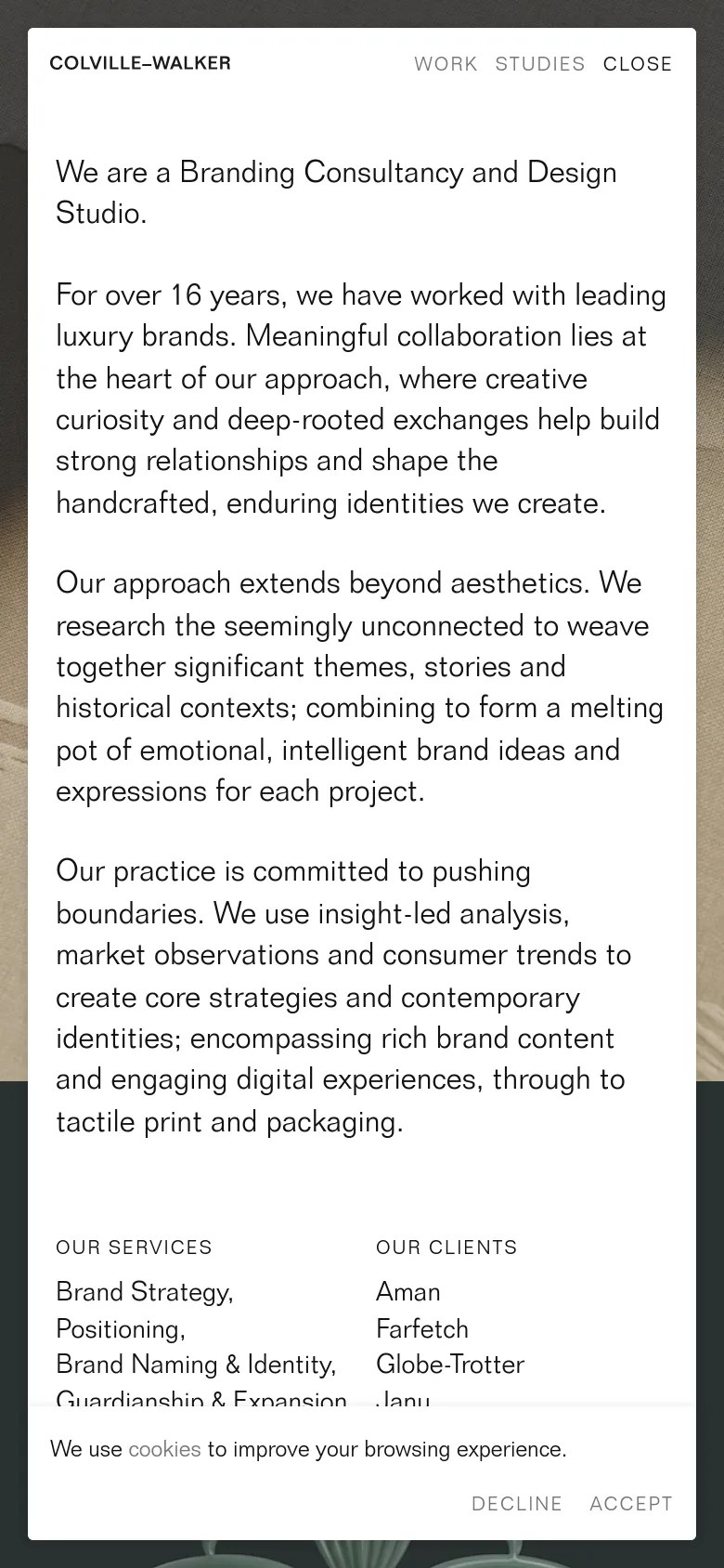 The mobile version transitions to a single-column vertical layout optimized for scrolling. The text is centered or left-aligned with increased line spacing for readability on small screens, and the multi-column information from the desktop view is stacked sequentially. The large background image remains visible but is cropped to focus on the central textures.