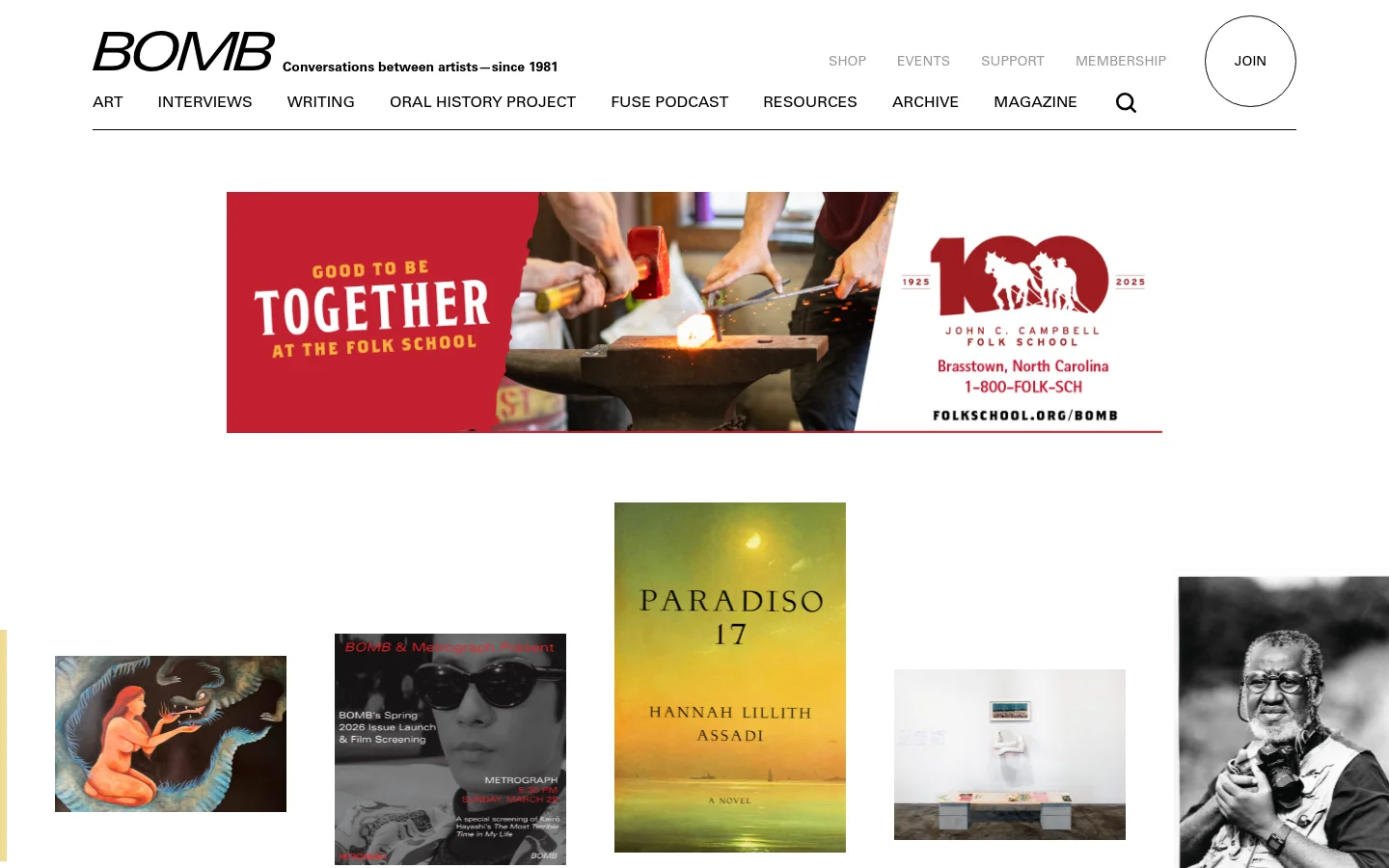 The BOMB Magazine desktop homepage features a clean white background with a black logo and a horizontal navigation menu including links for Art, Interviews, and Writing. A large hero banner displays a red and white graphic with the text 'GOOD TO BE TOGETHER AT THE FOLK SCHOOL' alongside a photo of someone working with metal. Below the banner, a grid of diverse artistic images and magazine covers is arranged in a masonry-style layout.