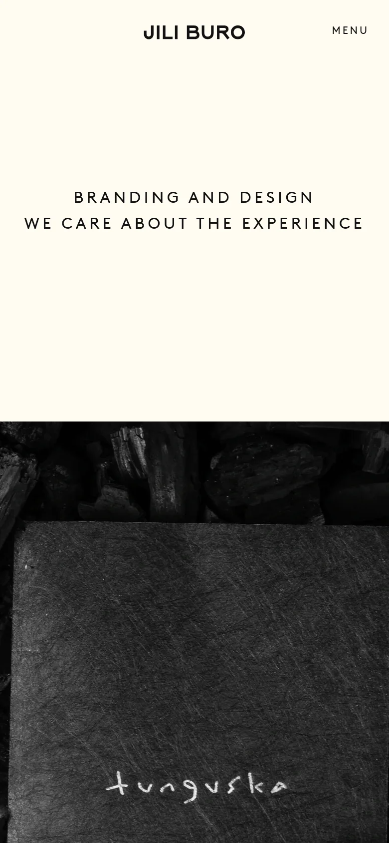The mobile version maintains the minimalist cream and black aesthetic but simplifies the layout. The top navigation is replaced by a 'MENU' button next to the 'JILI BURO' logo, and the hero text is centered vertically and horizontally above a dark, textured charcoal image.