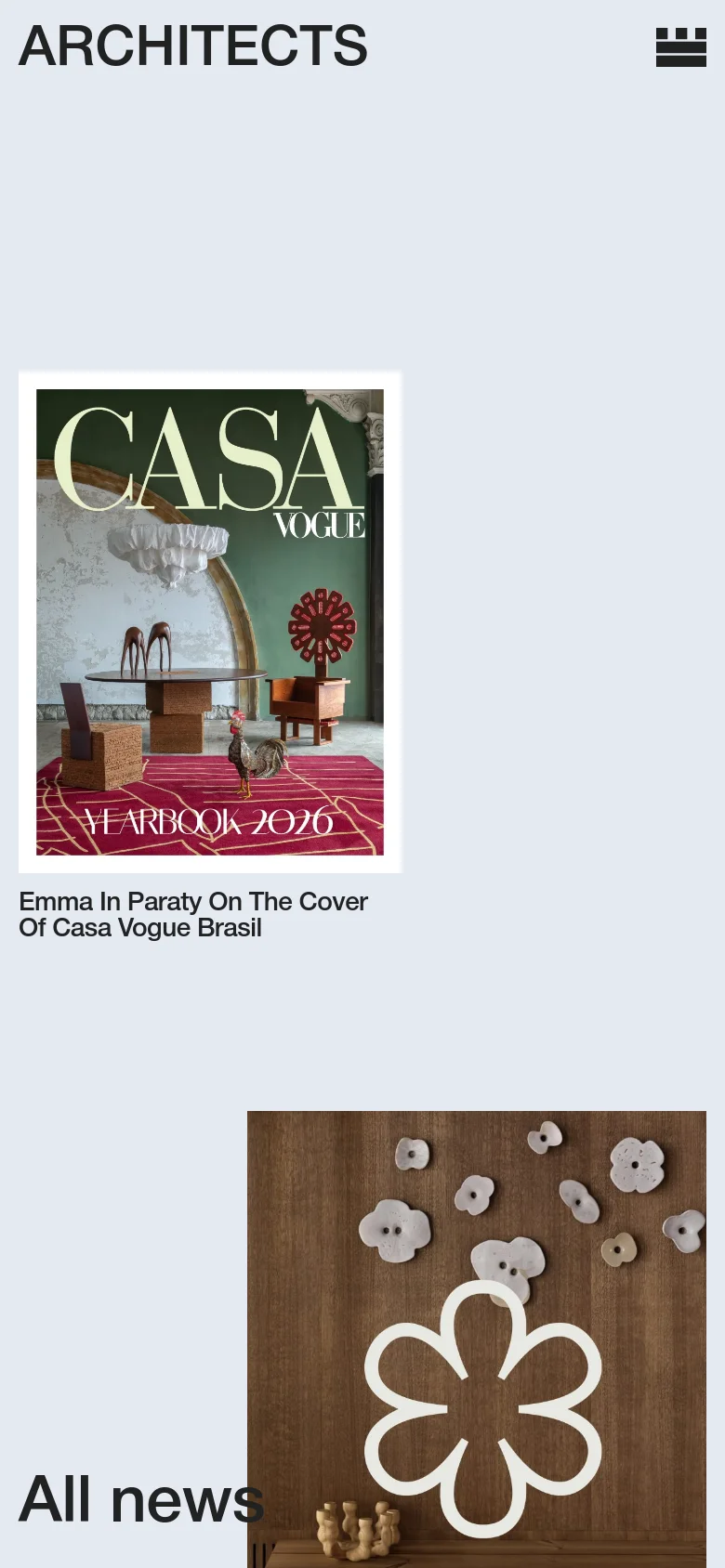 The mobile version presents a single-column vertical scroll of news entries. The layout is simplified, focusing on large imagery and headlines like 'Emma In Paraty On The Cover Of Casa Vogue Brasil' to ensure readability on small screens, with navigation links appearing as a list.