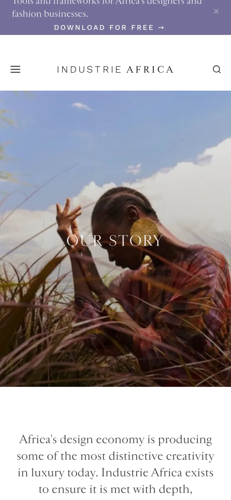The mobile version displays a condensed view with a hamburger menu icon on the left and a search icon on the right of the Industrie Africa logo. The hero image of a person in tall grass remains prominent with the 'OUR STORY' headline, but the navigation links are hidden within the menu. The layout shifts to a single-column format for the text content below the image.