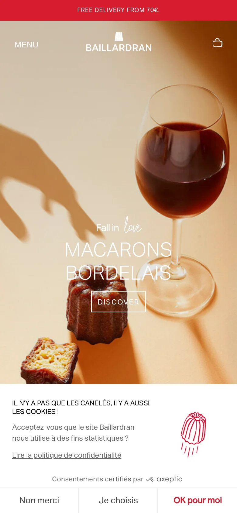 The mobile version uses a vertical layout with a simplified header containing a menu icon, the Baillardran logo, and a shopping bag icon. The hero section features the same Macarons Bordelais imagery and 'Discover' button, but scaled for a portrait screen. The cookie consent banner is repositioned to span the bottom of the viewport with large, easy-to-tap buttons.