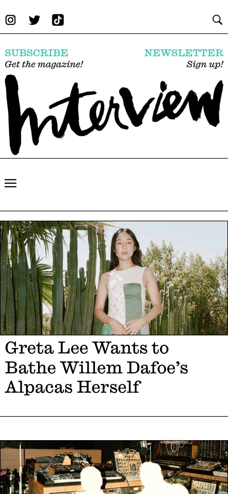 The mobile version presents a vertically stacked layout starting with the large Greta Lee hero image and headline. The navigation menu is collapsed into a hamburger icon, and the article grid transitions from multiple columns to a single-column list for easier scrolling on small screens.