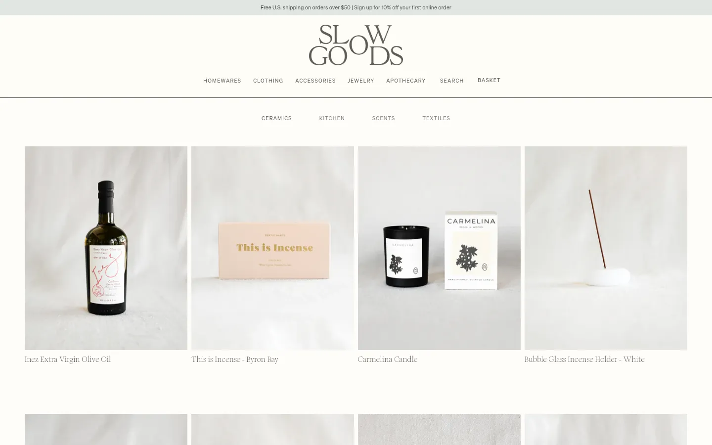 The desktop Homewares collection page features a minimalist design with a white background and centered 'Slow Goods' logo. A navigation menu includes categories like Ceramics, Kitchen, Scents, and Textiles, followed by a grid of large, high-quality product images showcasing olive oil, incense, candles, and glass holders. Each product image is paired with a clean text title and price below it.