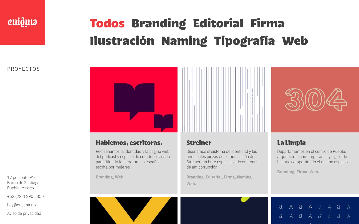 The Enigma agency homepage features a minimalist design with a red logo block on the left and a large, bold navigation menu for project categories like Branding and Web. A grid of project cards follows, each displaying a colorful graphic, a title, a brief description, and category tags. The layout uses high-contrast typography and a clean white background.