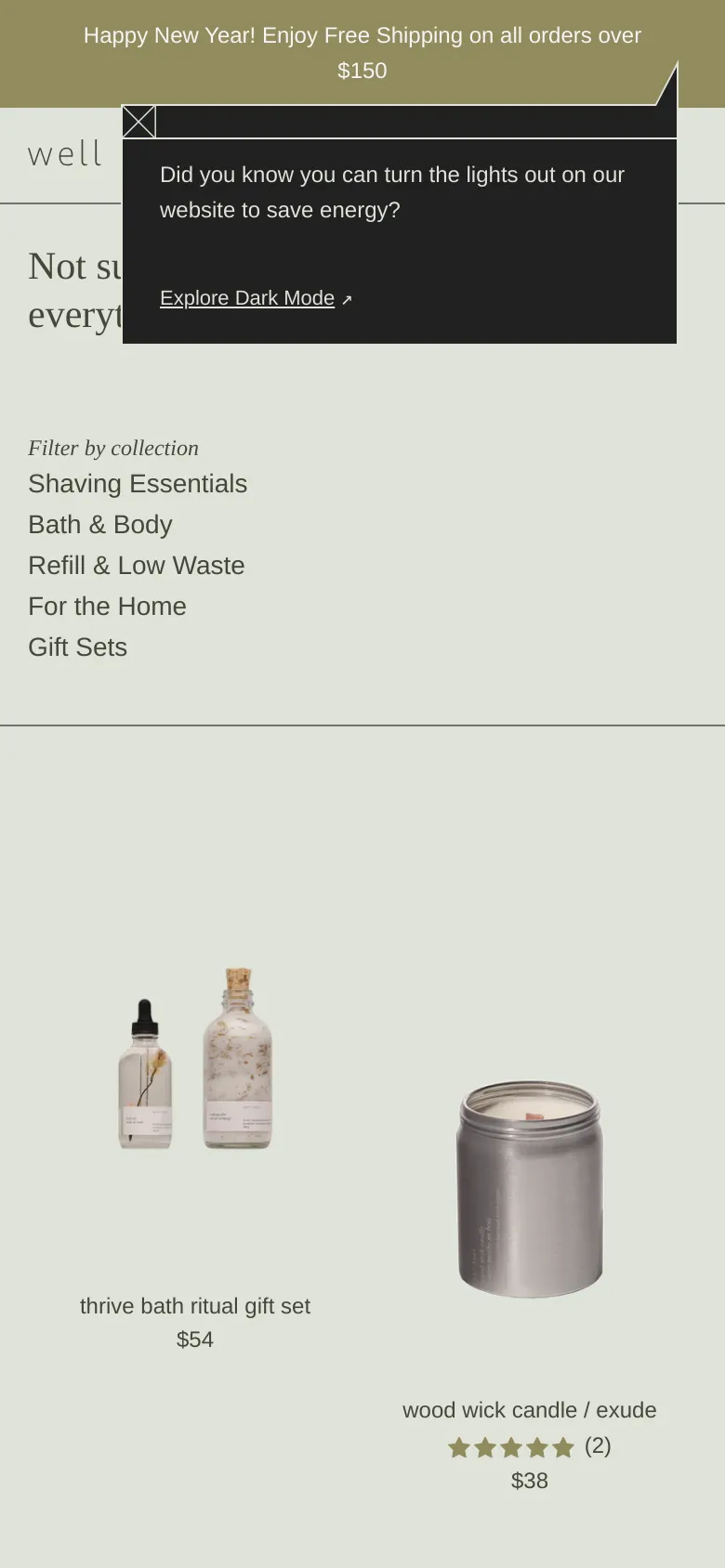 The mobile version presents a simplified, vertically stacked layout optimized for smaller screens. The product grid transitions to fewer columns, and the navigation and collection filters are condensed. The dark mode energy-saving pop-up appears larger and more central to the viewport compared to the desktop version.