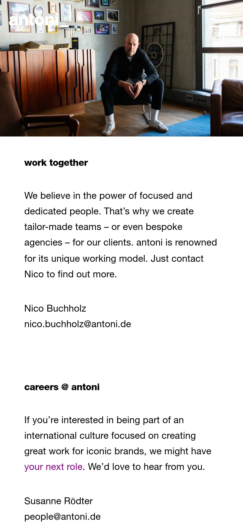 The mobile version presents a single-column vertical layout where the hero image of the man is positioned at the top, followed by the 'work together' headline and contact text below. The navigation menu is condensed, and the content is stacked for easier scrolling on a narrow screen.