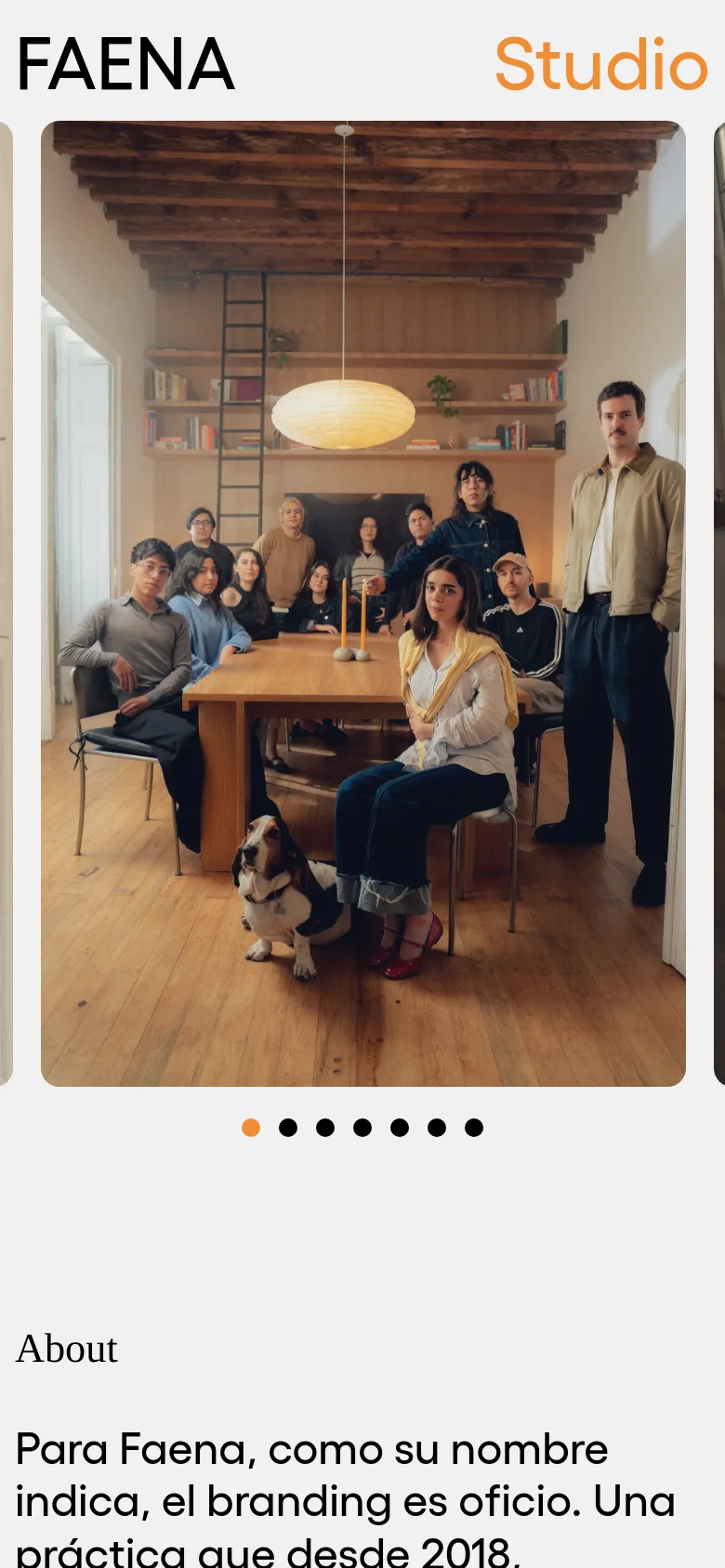 The mobile version presents a single-column layout starting with a large, centered image carousel of the studio team. Below the carousel, the 'About' heading and Spanish descriptive text are stacked vertically, followed by the services list. The navigation is simplified, focusing on a vertical scroll through the imagery and text content.