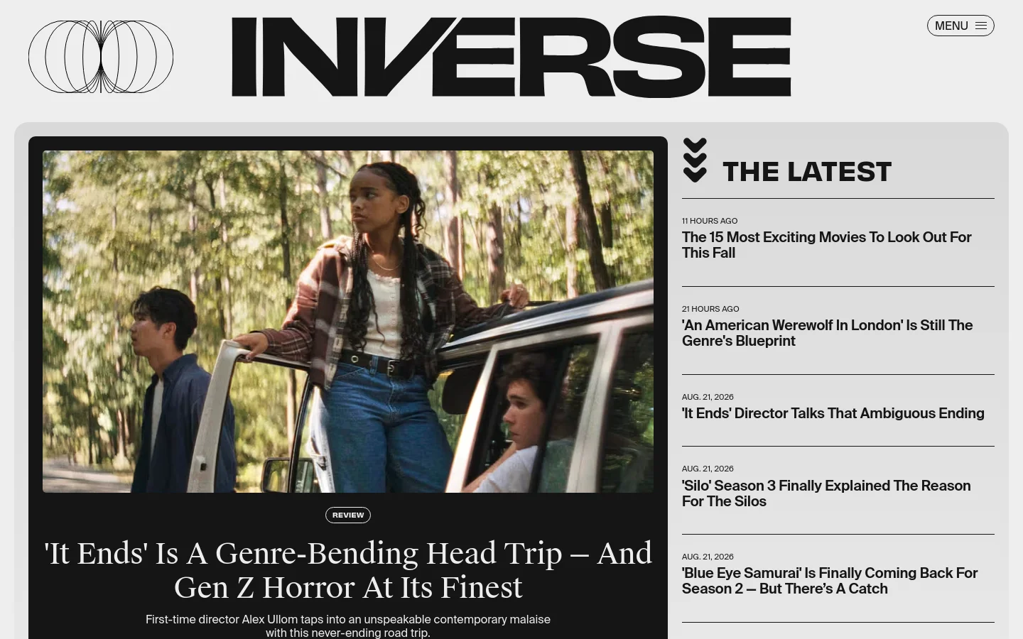 The Inverse homepage features a large hero section with a cinematic image of three people by a car, headlined by a review of the film 'It Ends'. To the right, a 'The Latest' sidebar lists recent articles with timestamps. The design uses a clean white and light gray color palette with bold black typography and a minimalist logo.