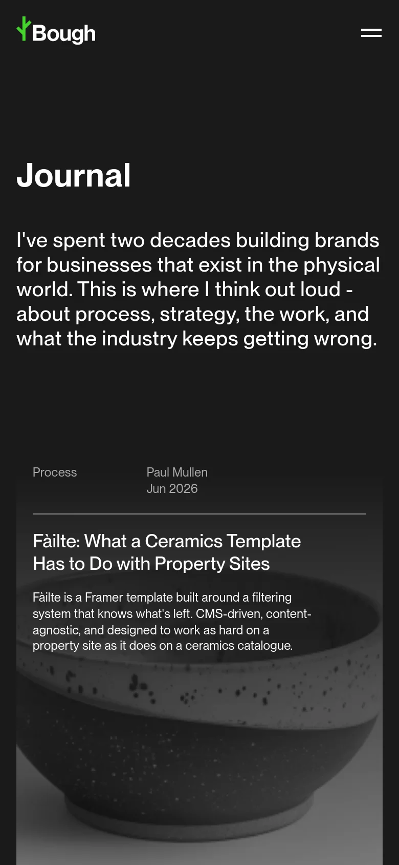 The mobile version maintains the dark theme and minimalist aesthetic but uses a single-column vertical layout. The navigation menu is condensed into a hamburger icon, and the article cards are stacked vertically to prioritize readability on a smaller screen.