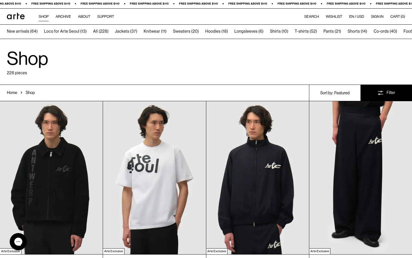 The desktop shop page features a minimalist white background with a top navigation bar and a horizontal list of product categories. A large 'Shop' heading is followed by a grid of high-quality product images showing models in contemporary clothing, with each item labeled 'Arte Exclusive' and including the price. The layout uses a clean, spacious design with a 'Sort by' dropdown and a 'Filter' button on the right.