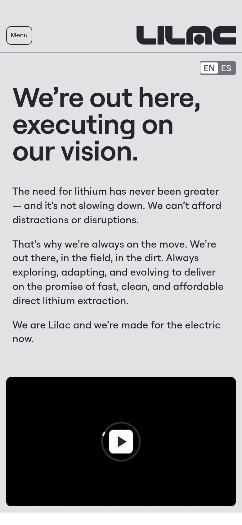 The mobile version uses a single-column layout on a light gray background, stacking the large headline above the mission text and the video player. A 'Menu' button replaces the horizontal navigation bar at the top, while the Lilac logo and language switcher remain visible.