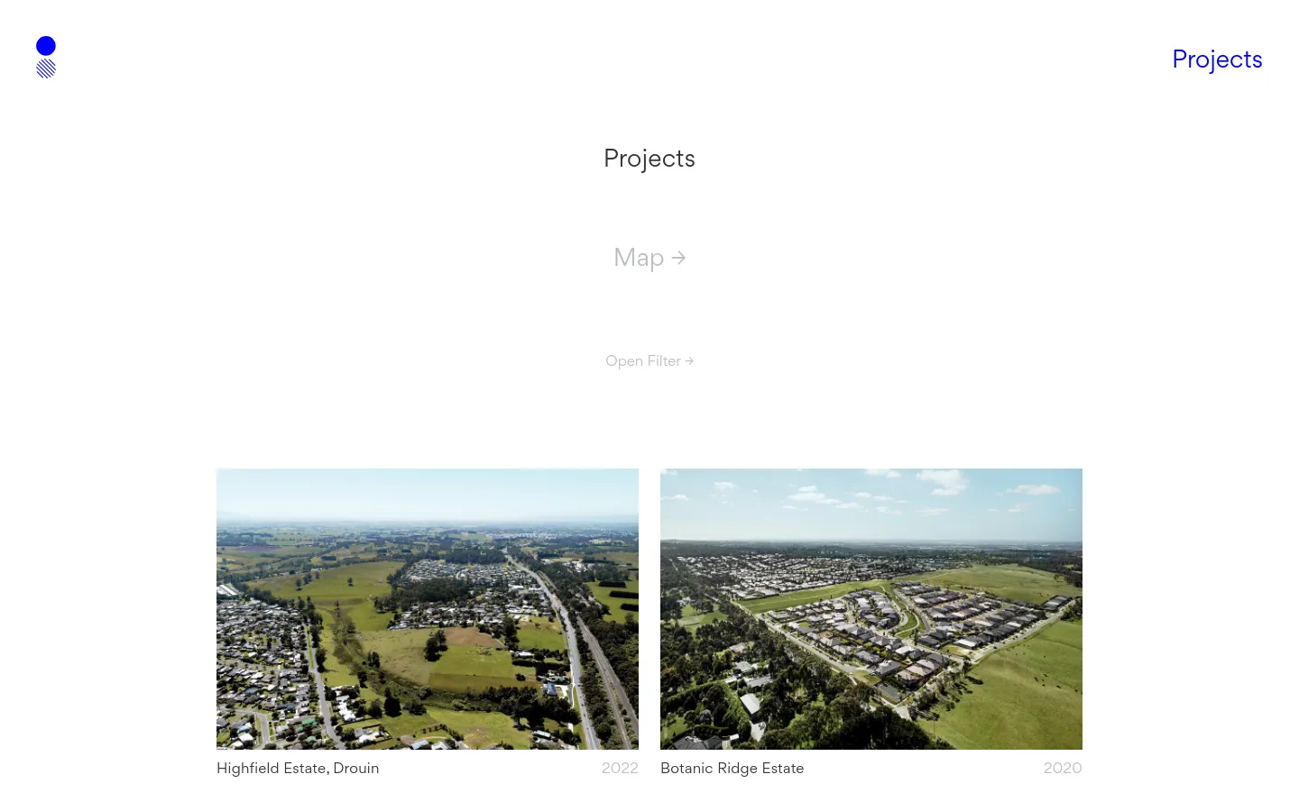 The Projects page features a clean, minimalist design with a white background and dark grey text. A large 'Projects' heading is centered above links for 'Map' and 'Open Filter', followed by a grid of large, high-quality aerial landscape photographs of property developments, each labeled with a project name and year.
