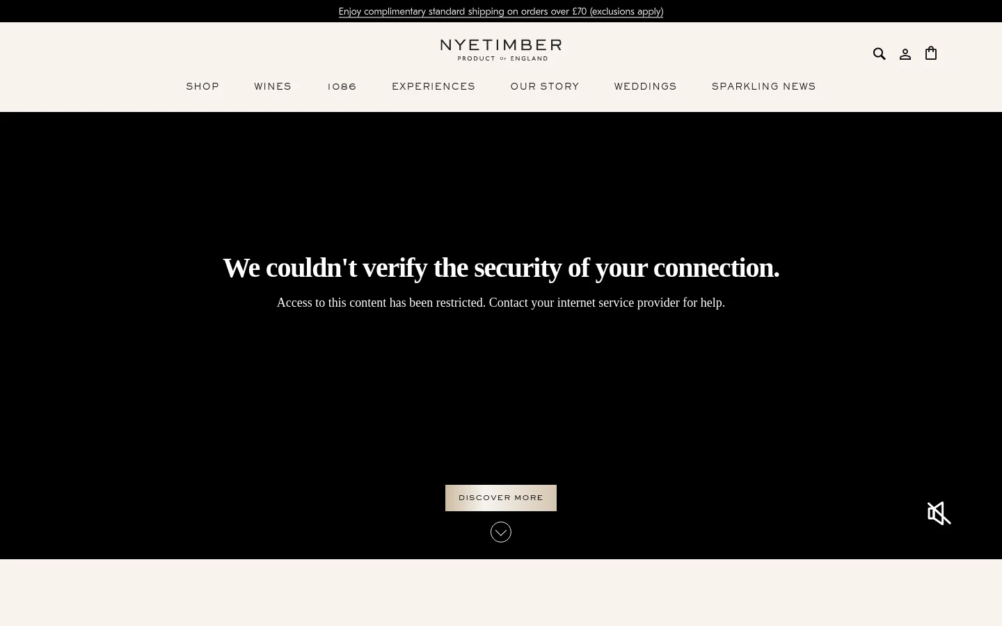 The Nyetimber homepage features a clean, minimalist design with a white header and navigation menu including Shop, Wines, and Experiences. A large hero video shows a group of people enjoying sparkling wine outdoors, overlaid with a 'DISCOVER MORE' button. Below, news sections feature high-quality photography of award-winning wines and rugby partnerships against a light background.