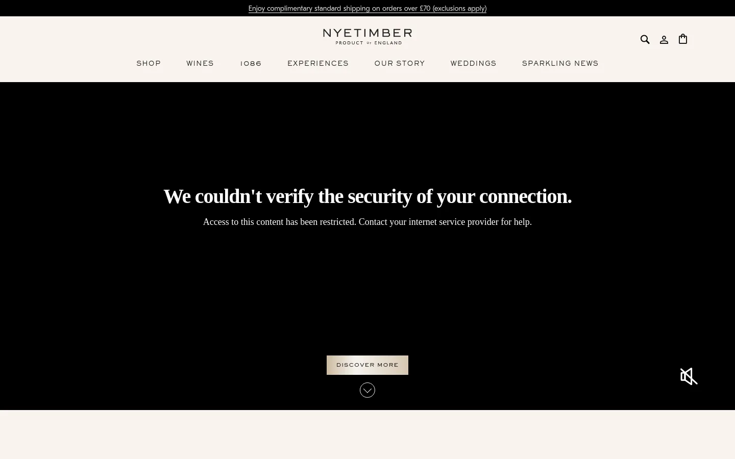 The Nyetimber homepage features a clean, minimalist design with a white header and navigation menu including Shop, Wines, and Experiences. A large hero video shows a group of people enjoying sparkling wine outdoors, overlaid with a 'DISCOVER MORE' button. Below, news sections feature high-quality photography of award-winning wines and rugby partnerships against a light background.