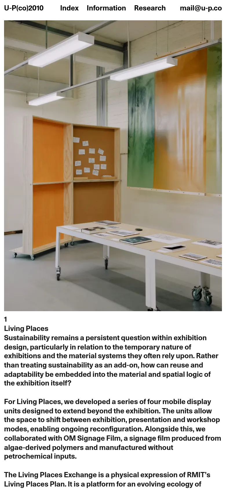 The mobile version presents a single-column vertical layout optimized for scrolling. The large exhibition hero image spans the width of the screen, followed by full-width text sections and large, stacked project images. The navigation menu is condensed at the top, and the sidebar content is integrated into the main vertical flow.