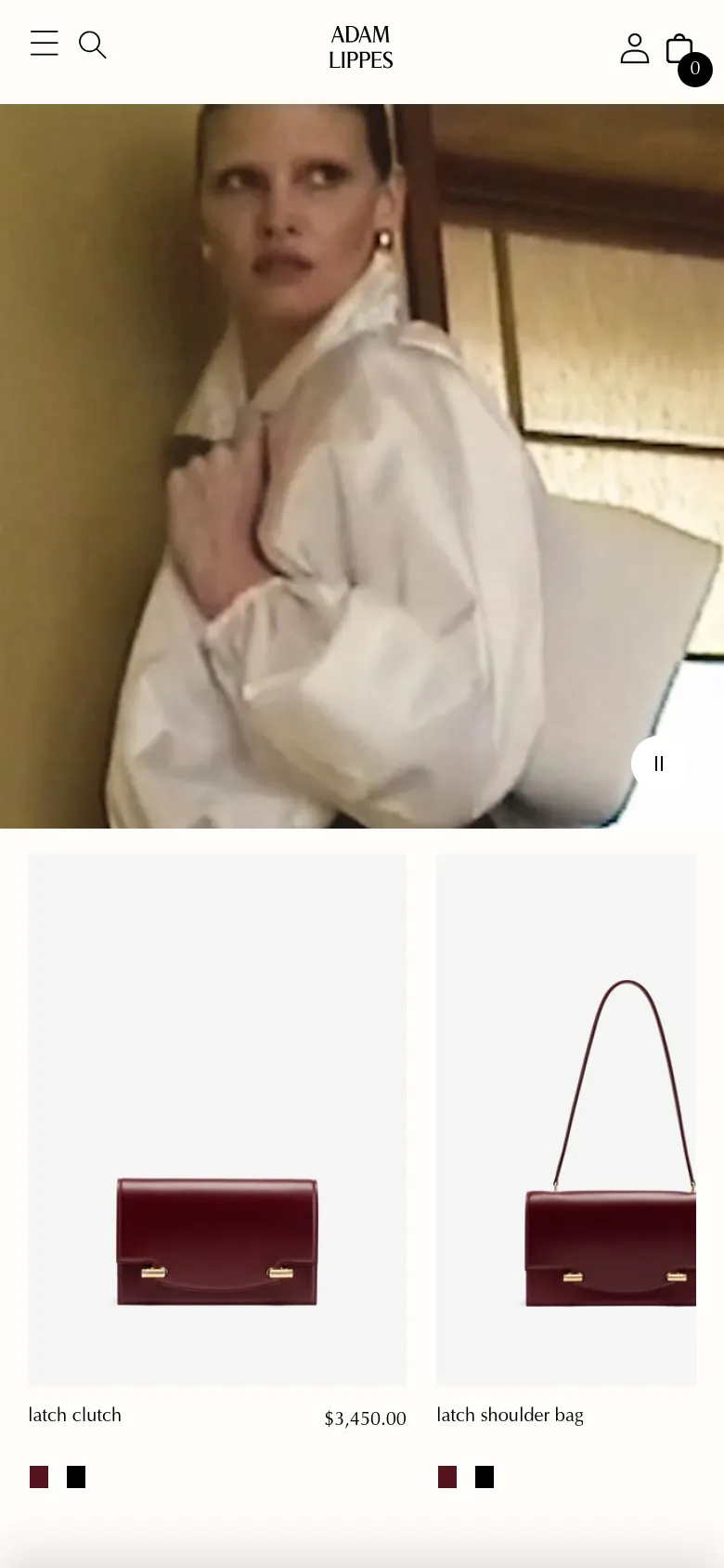 The mobile version uses a condensed header with a hamburger menu, search icon, and user profile icon, while the Adam Lippes logo remains centered. The hero video is scaled for a vertical aspect ratio, and the product grid shifts to a single-column layout, showing large images of the latch clutch and latch shoulder bag with prices listed below.