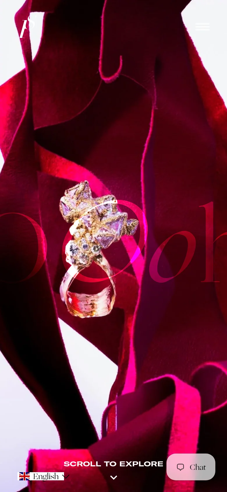 The mobile version maintains the dramatic hero imagery of the gold ring and red fabric, but the layout is vertically oriented to fill the screen. The 'Oooh' text and 'Scroll to Explore' prompt are repositioned for a narrow view, and a prominent 'Chat' button is located in the bottom right corner for easy thumb access.
