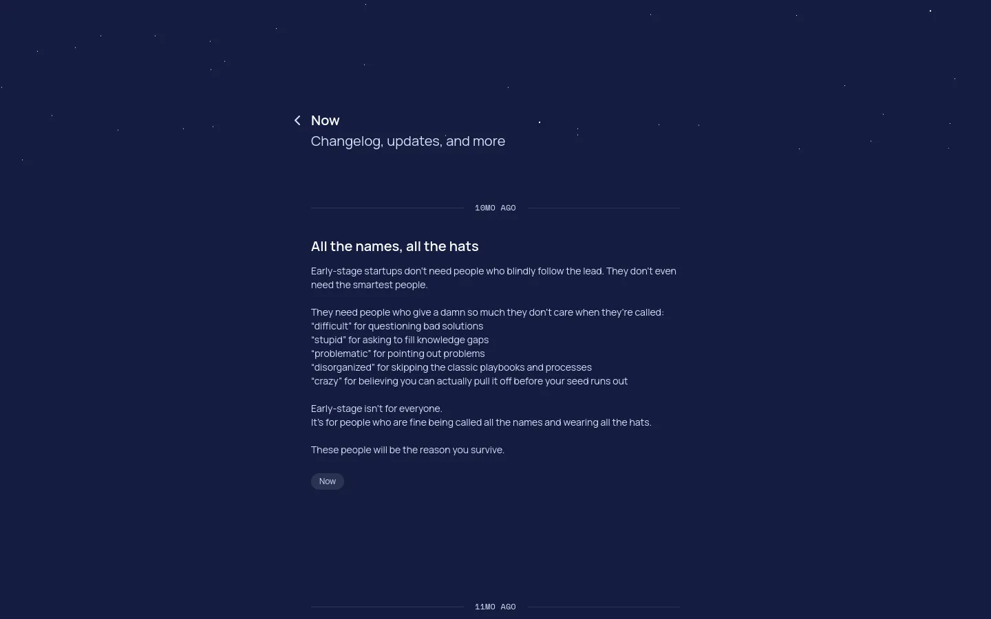 A minimalist desktop page with a dark navy background featuring subtle, scattered white dots. The layout is centered with a back link to 'Now', a large headline 'Now' followed by a subheadline 'Changelog, updates, and more', and a text-heavy section titled 'All the names, all the hats' describing early-stage startup culture.