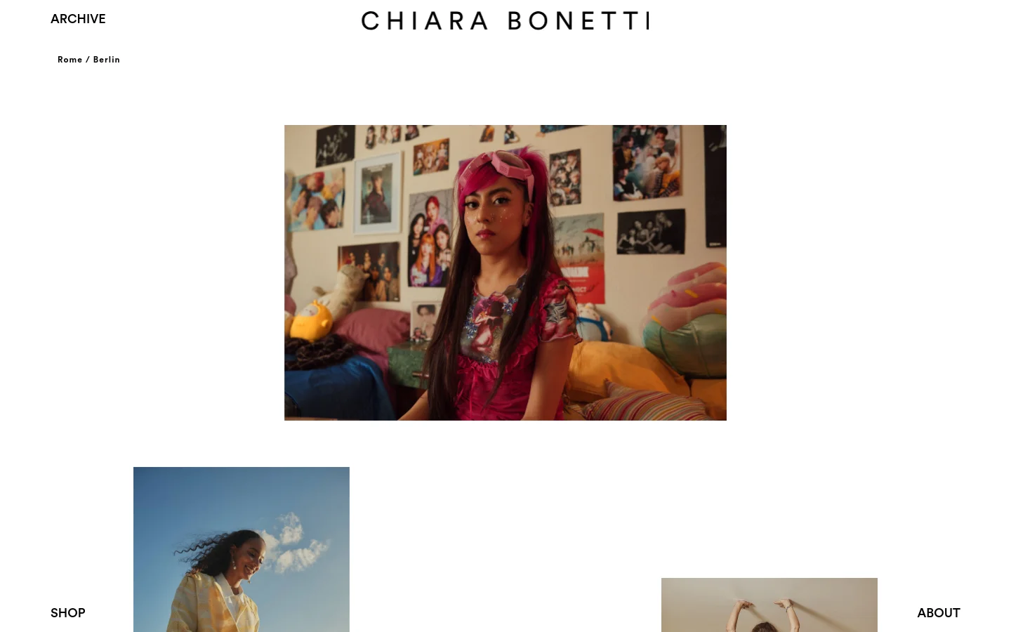The desktop homepage for photographer Chiara Bonetti features a minimalist white layout with large, high-quality photographic tiles arranged in a masonry grid. The header displays the name 'CHIARA BONETTI' in a clean sans-serif font, with navigation links for About, Archive, and Shop, and the location 'Rome / Berlin' visible. The imagery is diverse, showcasing fashion, portraits, and travel photography with a vibrant, cinematic color palette.