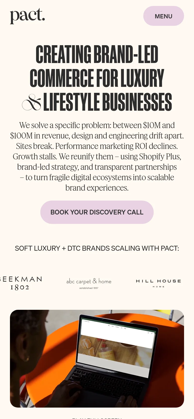 Mobile version of the Pact homepage with a centered layout and stacked typography. The large headline, descriptive text, and light purple call-to-action button are vertically aligned, followed by a client logo section and a large hero image of a person using a laptop.
