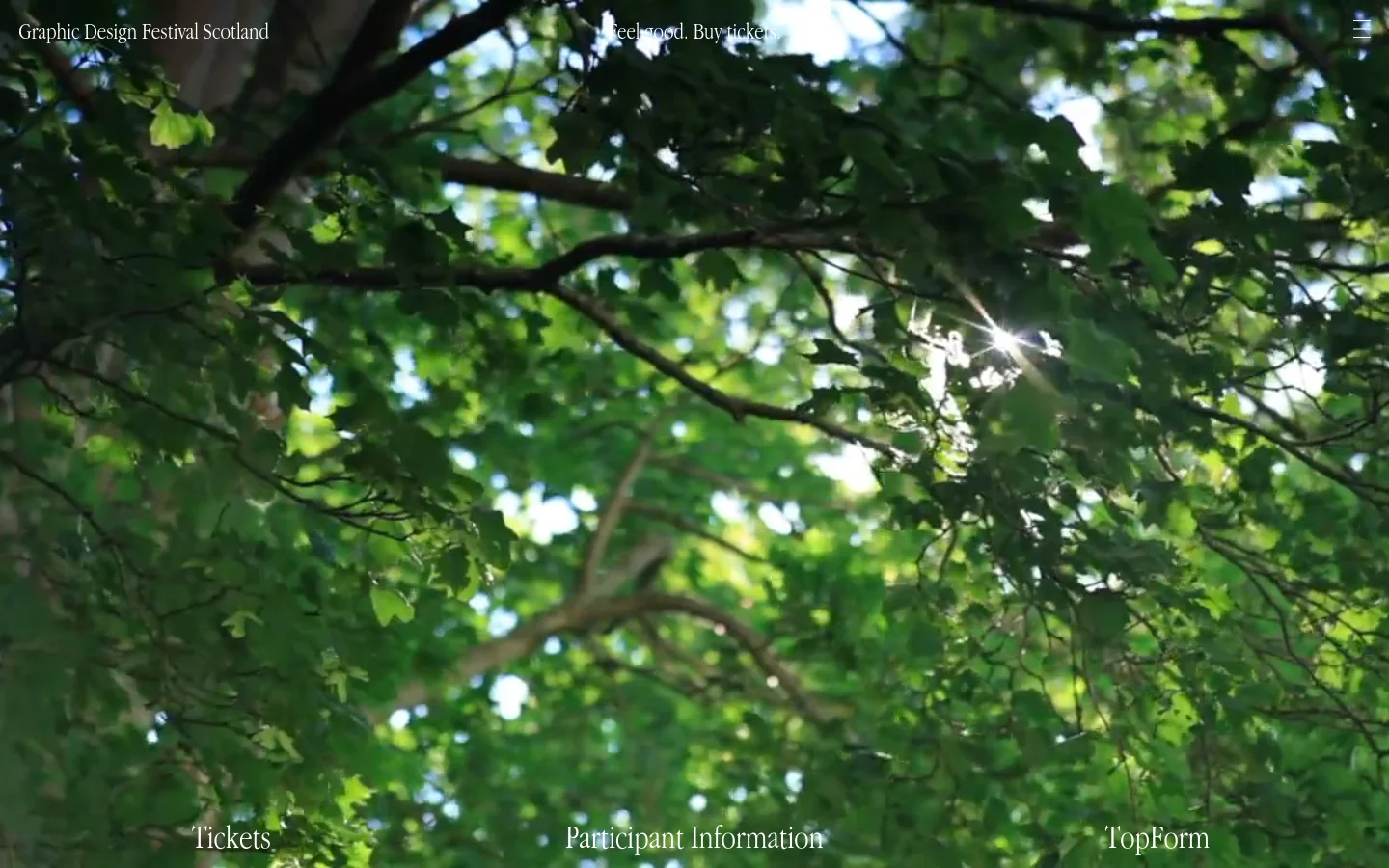 The desktop homepage features a full-screen hero image of green tree leaves against a bright sky. Overlaying the image are white text links for 'Graphic Design Festival Scotland', 'Feel good. Buy tickets.', 'Tickets', 'Participant Information', and 'TopForm'.