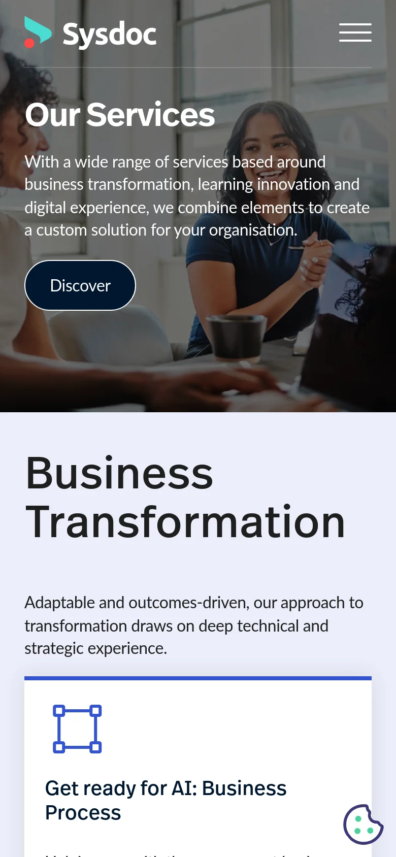 The mobile version presents a vertically stacked layout, starting with a condensed hero image of office workers and the 'Our Services' headline. The 'Discover' call-to-action button is centered and larger for touch interaction. The 'Business Transformation' section follows, with text and service cards scaled to fit a narrow single-column view.