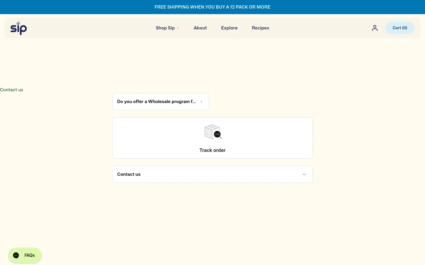The desktop Contact page features a minimalist design with a cream background and a blue announcement bar at the top. The layout includes a navigation menu with links for Shop Sip, About, Explore, and Recipes, followed by three large, rounded rectangular buttons: 'Do you offer a Wholesale program for qualified ret', 'Track order' with a package icon, and a 'Contact us' dropdown menu.