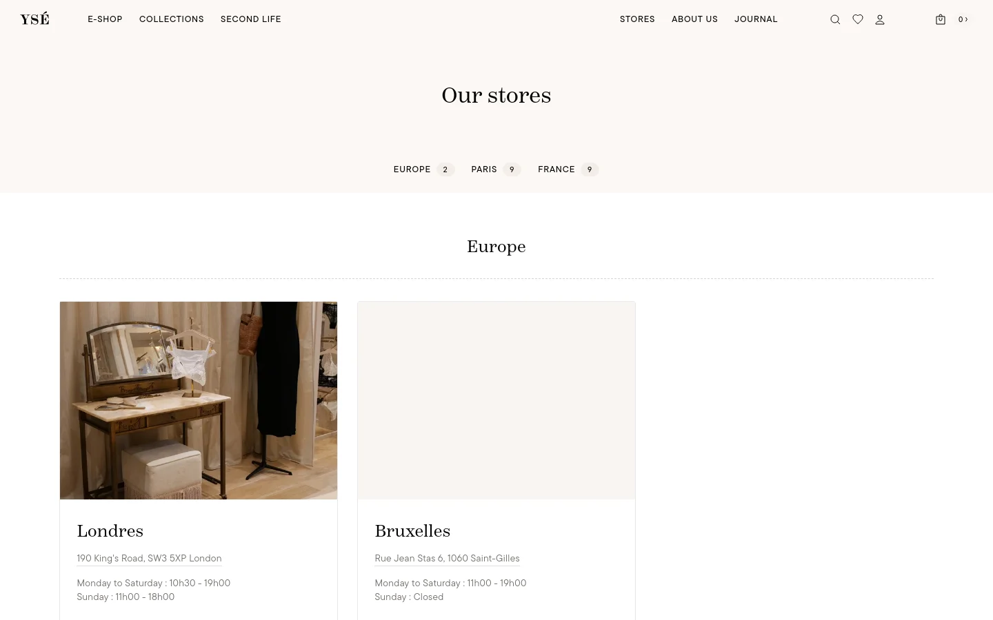 The desktop page features a minimalist design with a cream background and centered serif typography. A list of store locations by region is at the top, followed by a grid of store cards, each containing a large lifestyle image of the boutique interior, the city name, address, hours, and a call to action for fitting appointments.