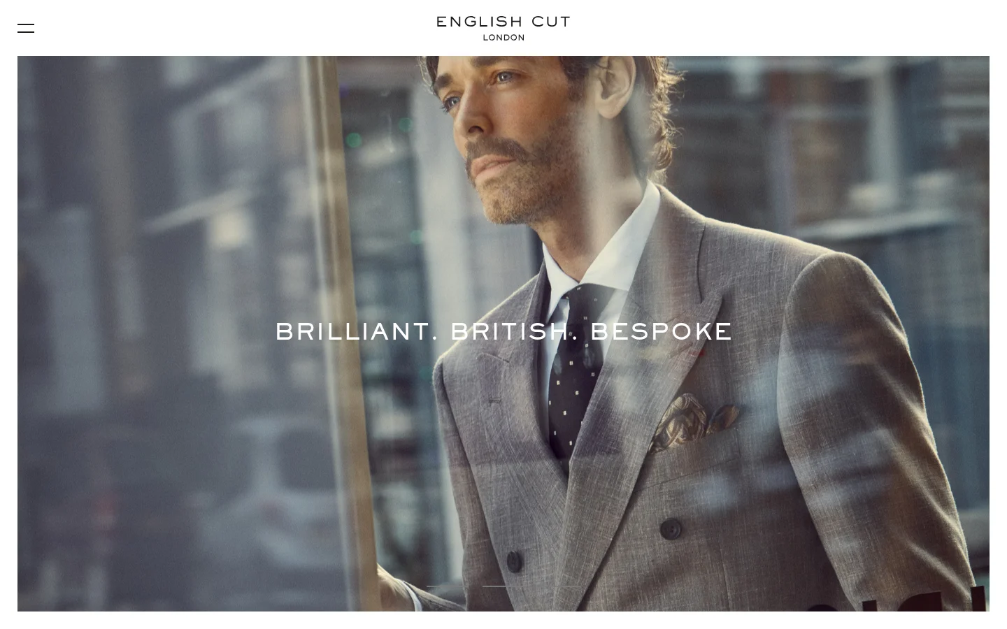 The desktop homepage features a large hero image of a man in a grey bespoke suit and polka dot tie looking out a window. Centered over the image is the headline 'BRILLIANT. BRITISH. BESPOKE' in white capital letters. The navigation includes the 'ENGLISH CUT LONDON' logo at the top center and a hamburger menu icon on the top left.