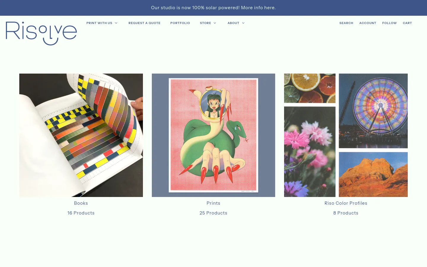 The Risolve Studio store page features a clean white background with a blue announcement bar at the top. Three large rectangular image tiles represent product collections: a color swatch book for 'Books', an anime-style illustration for 'Prints', and a collage of citrus, flowers, and a ferris wheel for 'Riso Color Profiles'. Each tile is followed by a text heading and the number of products available.