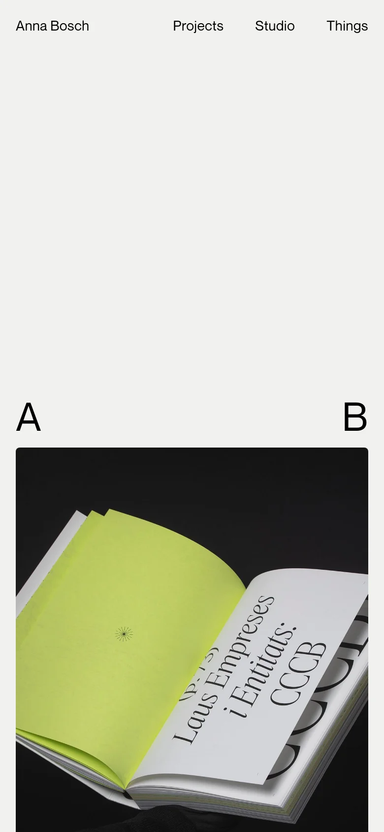 The mobile version maintains the minimalist white aesthetic but transitions to a single-column vertical scroll. The large 'A' and 'B' typography and the hero image are stacked vertically, making the project imagery the primary focus as the user scrolls down.