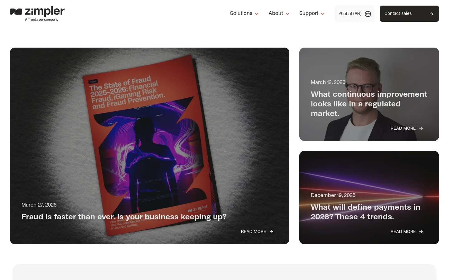 The Zimpler blog page features a clean white header with navigation links for Solutions, About, and Support, alongside a 'Contact sales' button. The main content area displays a grid of blog post cards with large, dark-themed imagery and white text overlays including dates, headlines, and 'READ MORE' links. A large featured post on the left shows a person's silhouette against a red document titled 'The State of Fraud 2025-2026'.