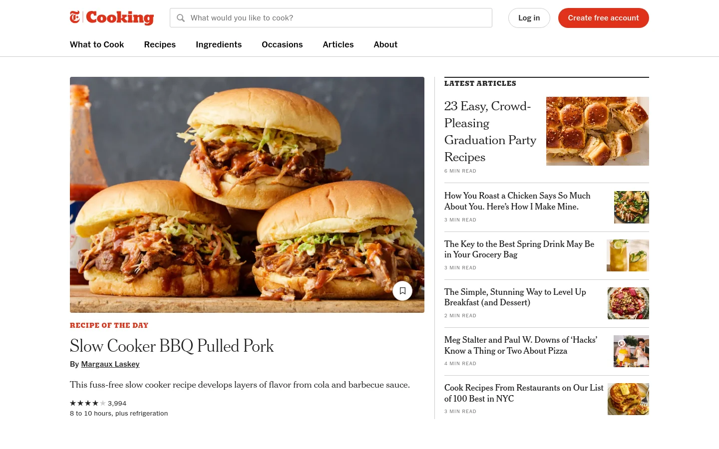 The NYT Cooking homepage features a large hero image of BBQ pulled pork sliders under the 'Recipe of the Day' heading. A sidebar on the right lists 'Latest Articles' with small thumbnail images and reading times. The layout is clean with a white background, black text, and a navigation bar at the top containing a search field and login buttons.