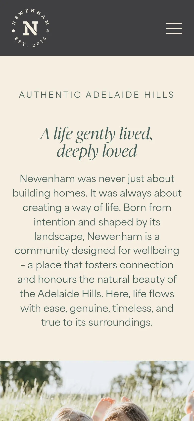 The mobile version simplifies the layout, removing the side-by-side hero split and the top navigation bar in favor of a centered header with a hamburger menu icon. The cream-colored section contains the main text and headlines stacked vertically, followed by the large lifestyle photograph of children in a field below the text content.