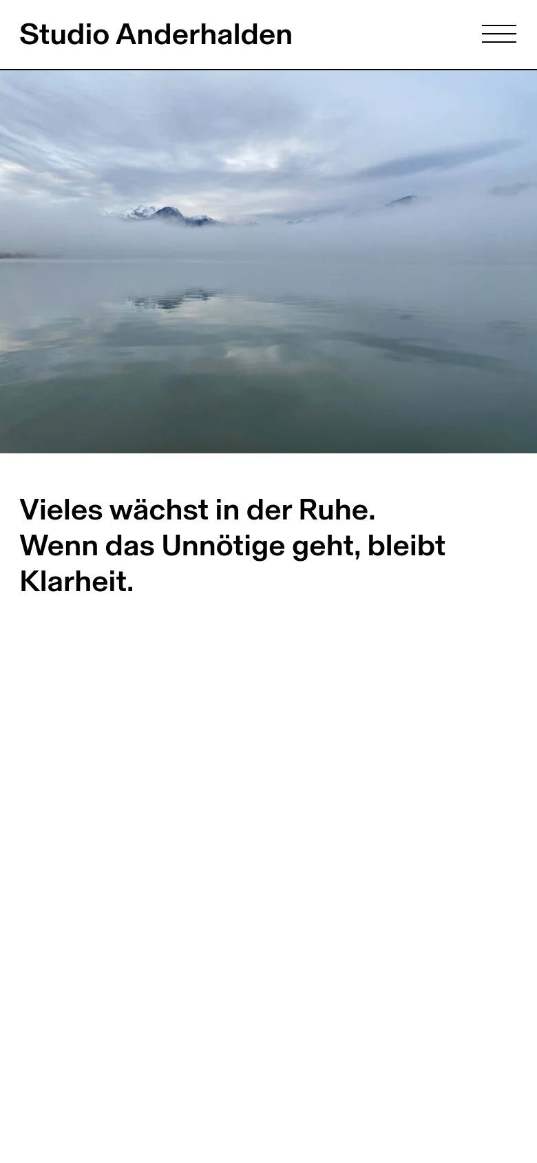 The mobile version presents a simplified layout with the 'Studio Anderhalden' title on the left and a hamburger menu icon on the right. The hero image of misty mountains and water remains central, followed by the same large black headline text on a white background.