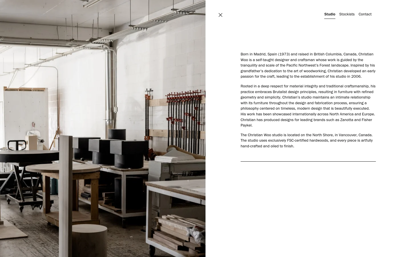 A split-screen desktop layout featuring a large, high-quality photograph of a bright, industrial woodworking studio on the left and a clean white section on the right. The right side contains biographical text about Christian Woo, with a minimalist navigation menu at the top right including links for Studio, Stockists, and Contact.