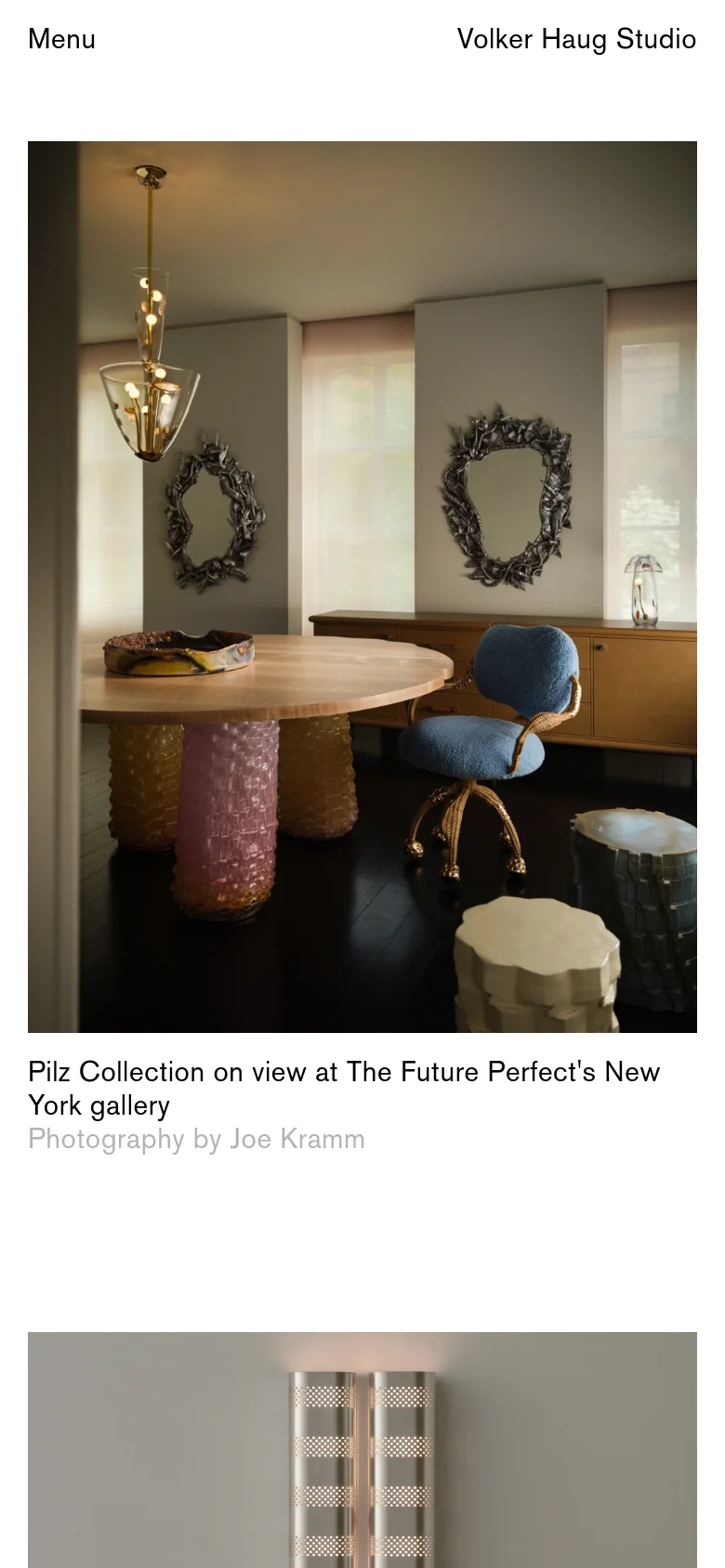 The mobile version simplifies the layout with a 'Menu' button on the top left and the studio name on the right. The large hero image of the Pilz Collection remains the central focus, spanning the width of the screen, followed by descriptive text and photography credits below it.