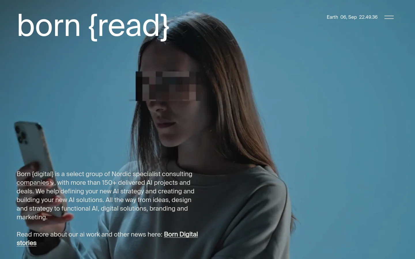 The desktop homepage features a large hero section with a blue-toned background image of a person looking at a smartphone, overlaid with the large white text 'born {ready}'. A navigation menu is in the top right, and a descriptive paragraph about the company's AI consulting services is positioned at the bottom left. The design is minimalist with a focus on high-quality photography and clean typography.